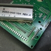 Both the connector strip and the PCB pads are cleaned thoroughly with isopropyl alcohol (IPA) and cotton buds.
