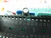 A third leaky cap has caused corrosion on the nearby 40-pin socket pins.