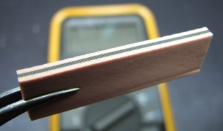 Elastomeric connector, aka 'zebra strip'