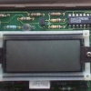 LCD held firmly in place with screw-down clips.