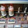 The display tubes are driven with 2 open-collector SN7441 BCD-to-decimal decoders.